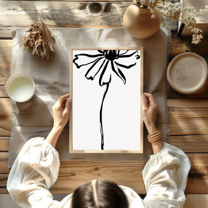 This elegant artwork features a minimalist ink sketch of a flower, embodying simplicity and grace. for Kitchen