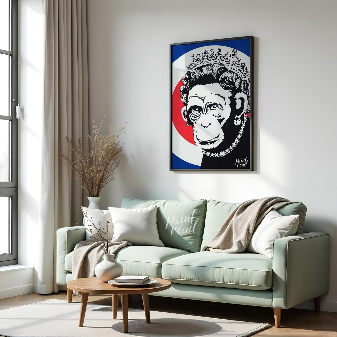 This provocative art print features Banksy’s “Monkey Queen” stencil, portraying Queen Elizabeth II … for living room