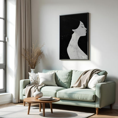 This striking artwork features a woman's profile rendered in stark black and white, creating a powe… for living room