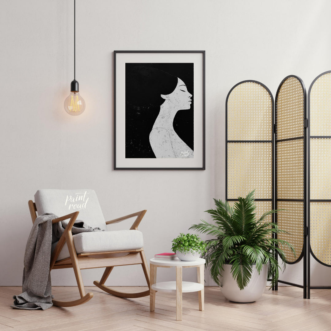 This striking artwork features a woman's profile rendered in stark black and white, creating a powe… for living room