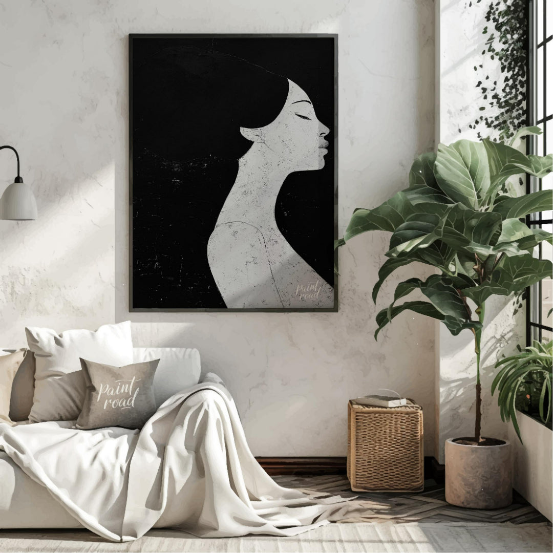 This striking artwork features a woman's profile rendered in stark black and white, creating a powe… for living room
