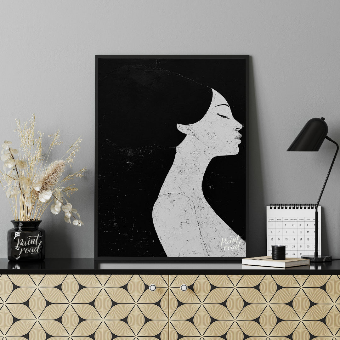 This striking artwork features a woman's profile rendered in stark black and white, creating a powe… for office