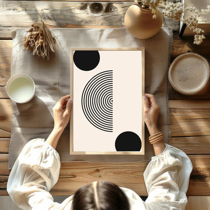 Dive into simplicity with this striking abstract piece featuring bold black spheres interwoven with for Kitchen