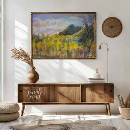 This watercolor painting captures a serene landscape with a mountain rising in the distance, framed… for living room