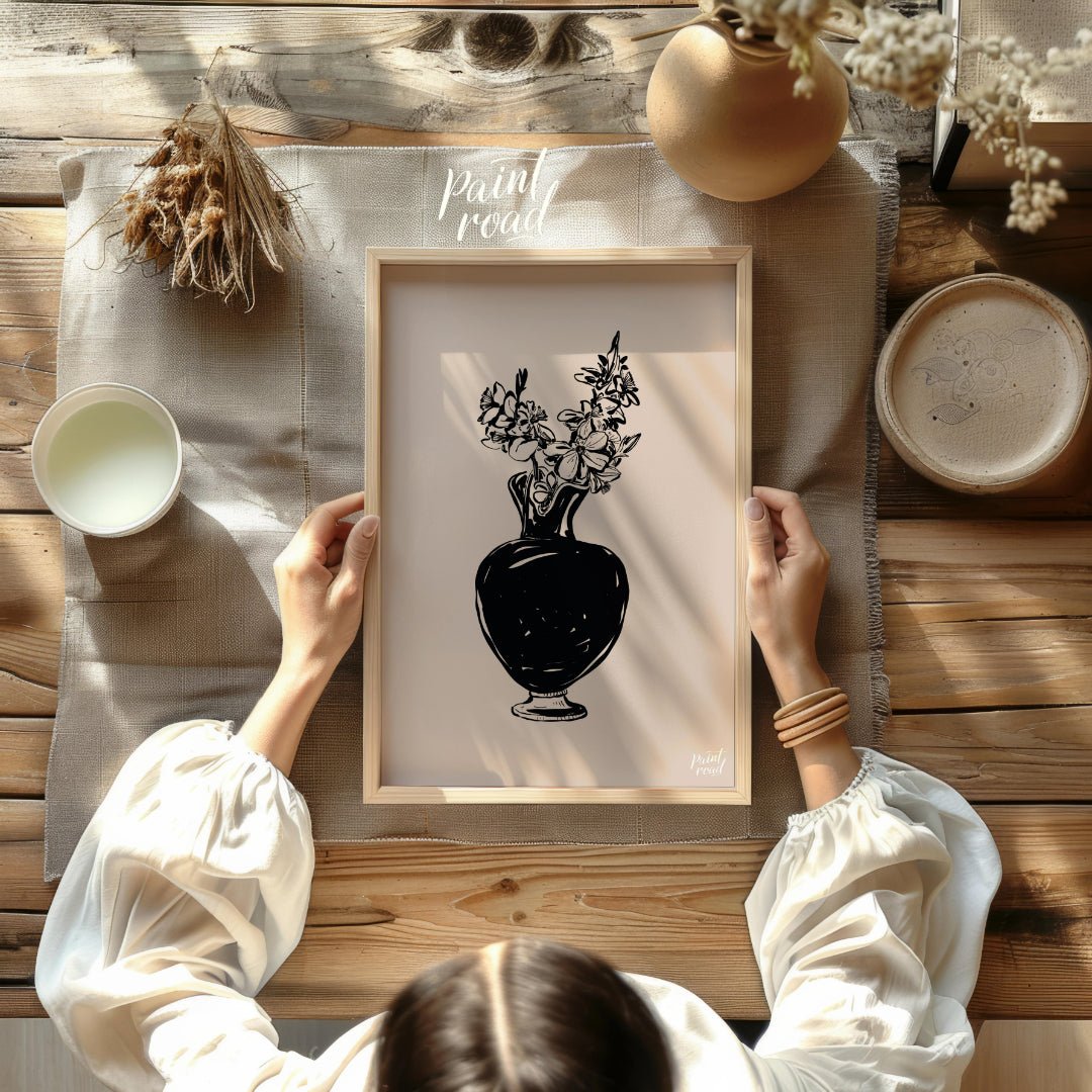 This elegant digital illustration features a black vase filled with delicate flowers, rendered in a… for other