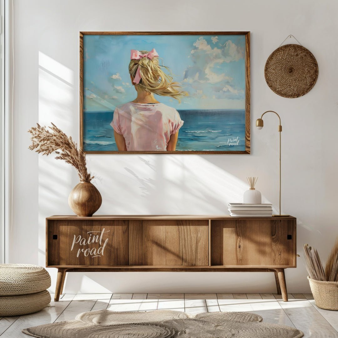 This artwork captures a serene moment by the sea, viewed from behind a figure with long, blonde hai… for living room