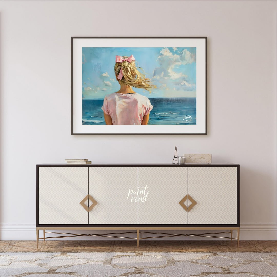 This artwork captures a serene moment by the sea, viewed from behind a figure with long, blonde hai… for living room