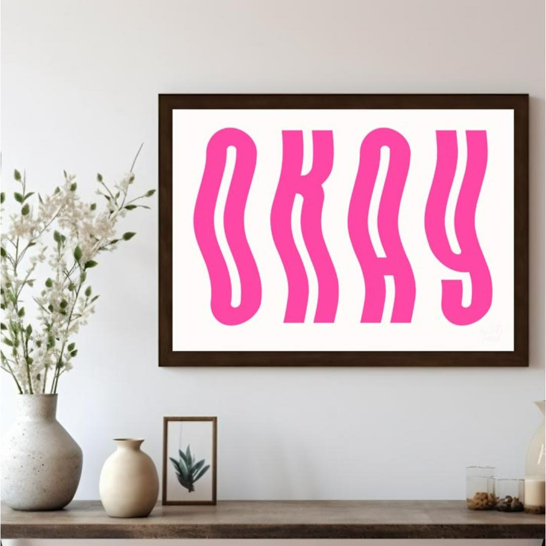 This minimalist and playful graphic features the word “OKAY” in large, bold, hot pink letters. The … for living room