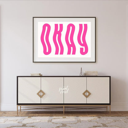 This minimalist and playful graphic features the word “OKAY” in large, bold, hot pink letters. The … for living room