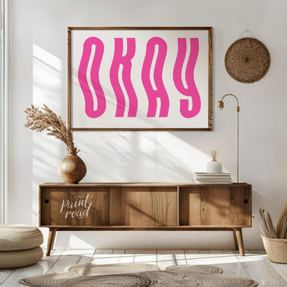 This minimalist and playful graphic features the word “OKAY” in large, bold, hot pink letters. The … for living room