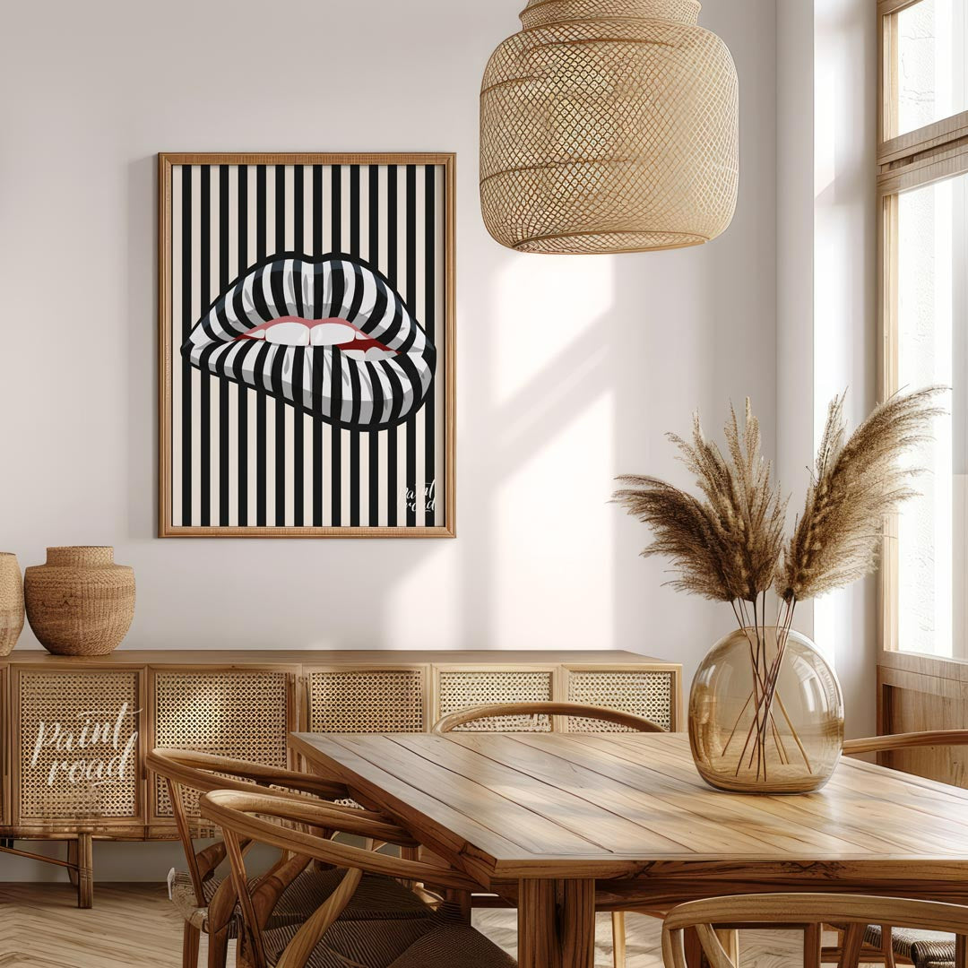 This striking art print features a close-up of an open mouth with lips adorned in a bold black and … for dining room
