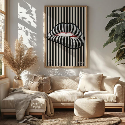This striking art print features a close-up of an open mouth with lips adorned in a bold black and … for living room