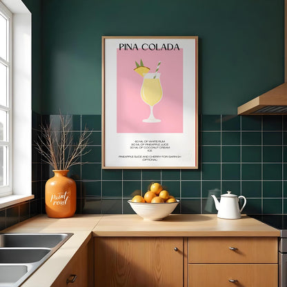 This charming minimalist poster features a delightful illustration of a Piña Colada. The drink is s… for kitchen