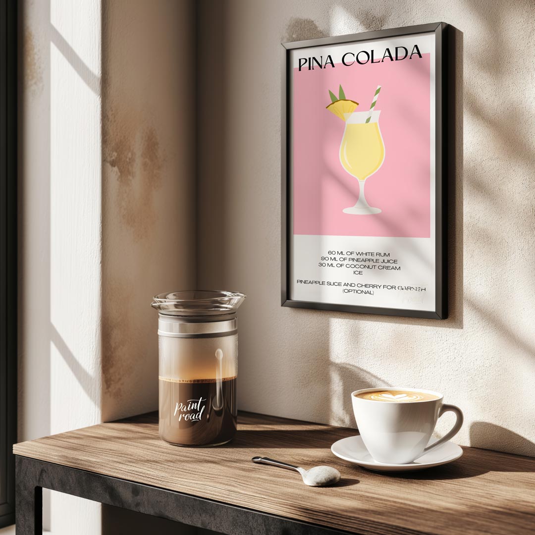 This charming minimalist poster features a delightful illustration of a Piña Colada. The drink is s… for kitchen