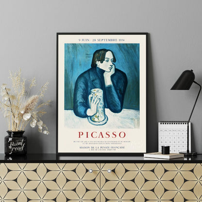 This vintage exhibition poster promotes a significant retrospective of Pablo Picasso’s works, “PICA… for office