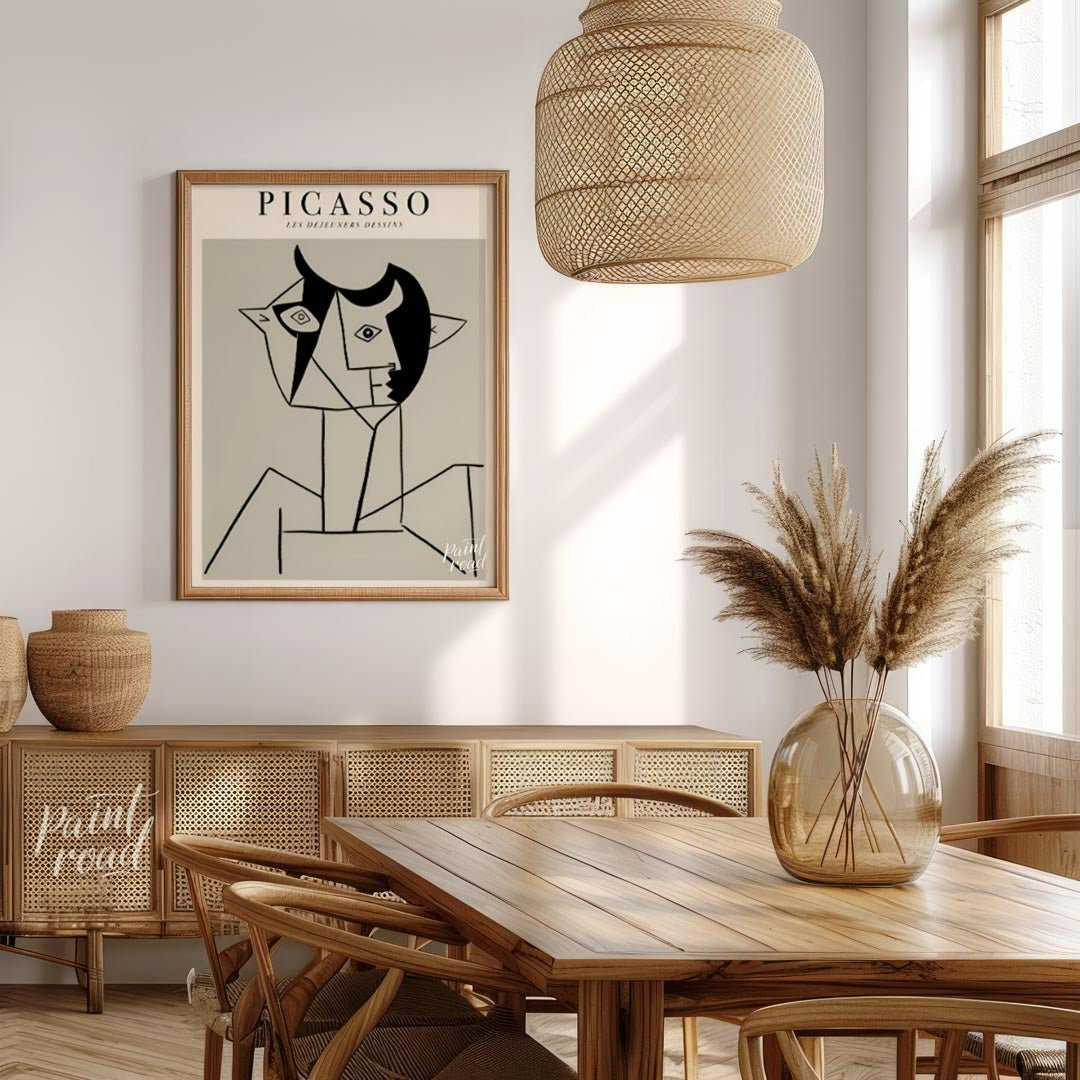 This poster features a striking line drawing by Pablo Picasso, characteristic of his distinctive cu… for dining room