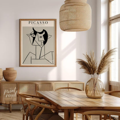 This poster features a striking line drawing by Pablo Picasso, characteristic of his distinctive cu… for dining room