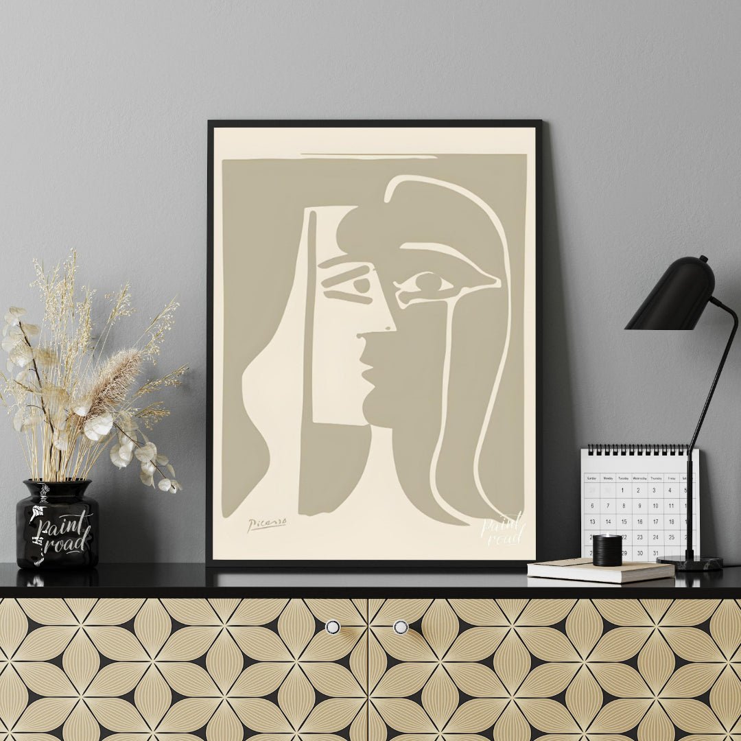 This striking artwork, titled "Cubist Woman in Profile," is a lithograph by Pablo Picasso, created … for office
