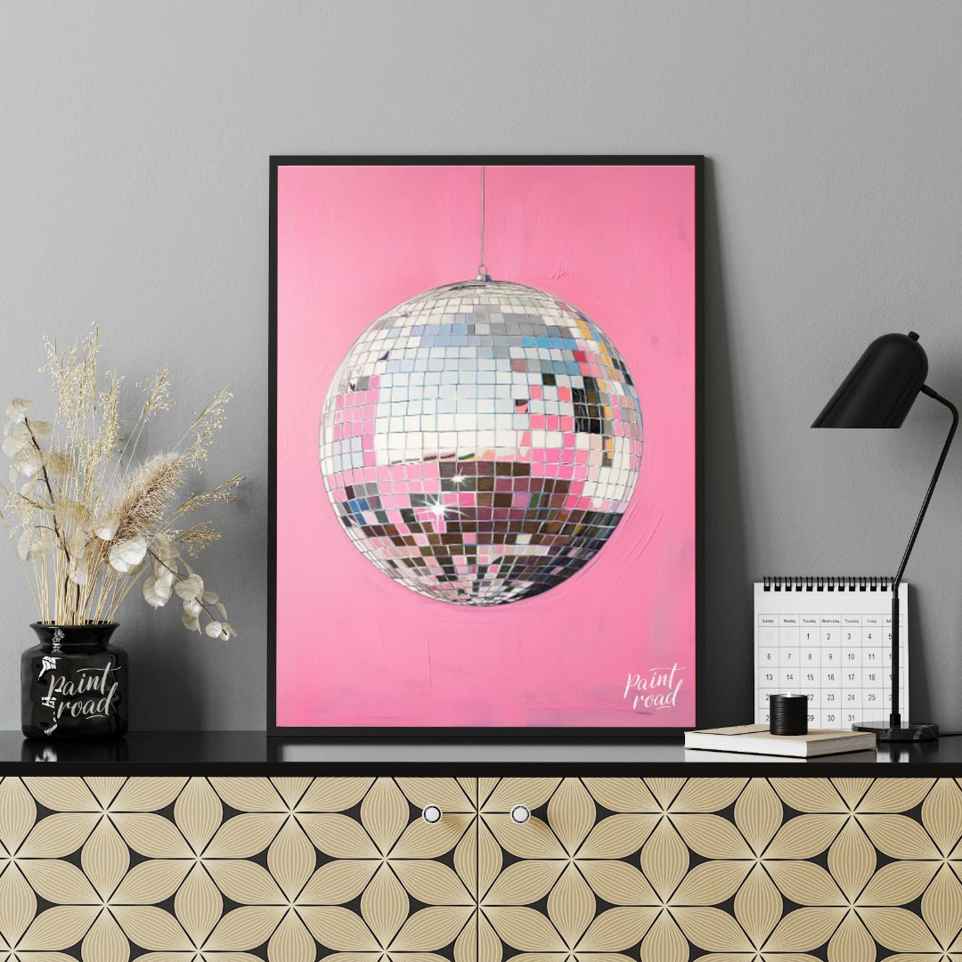 "Pink Disco" presents a striking image of a mirrored disco ball against a vibrant pink background. … for office