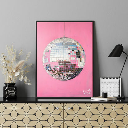 "Pink Disco" presents a striking image of a mirrored disco ball against a vibrant pink background. … for office