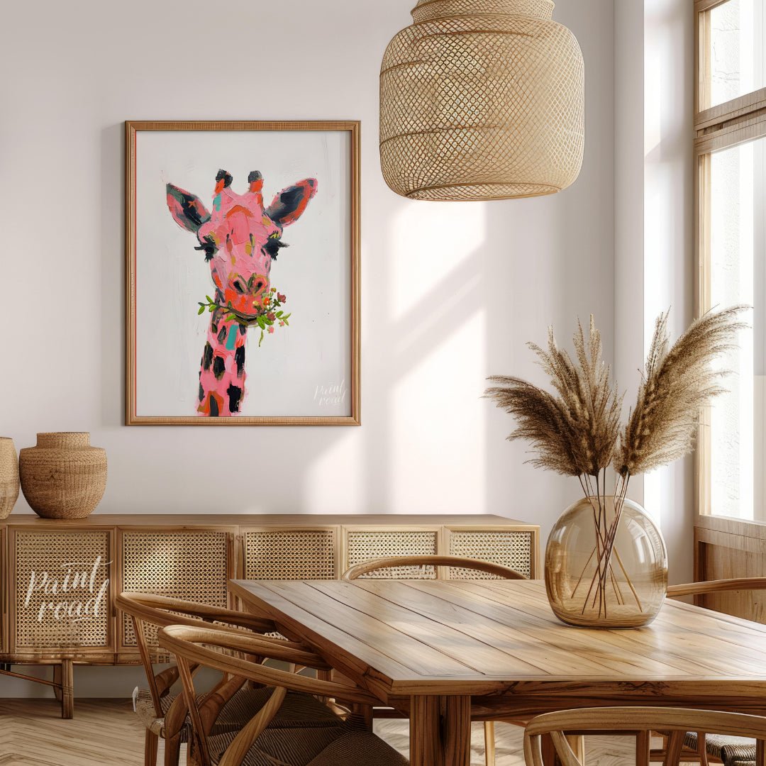 This whimsical painting features a giraffe rendered in a playful palette of pinks, oranges, and bla… for dining room