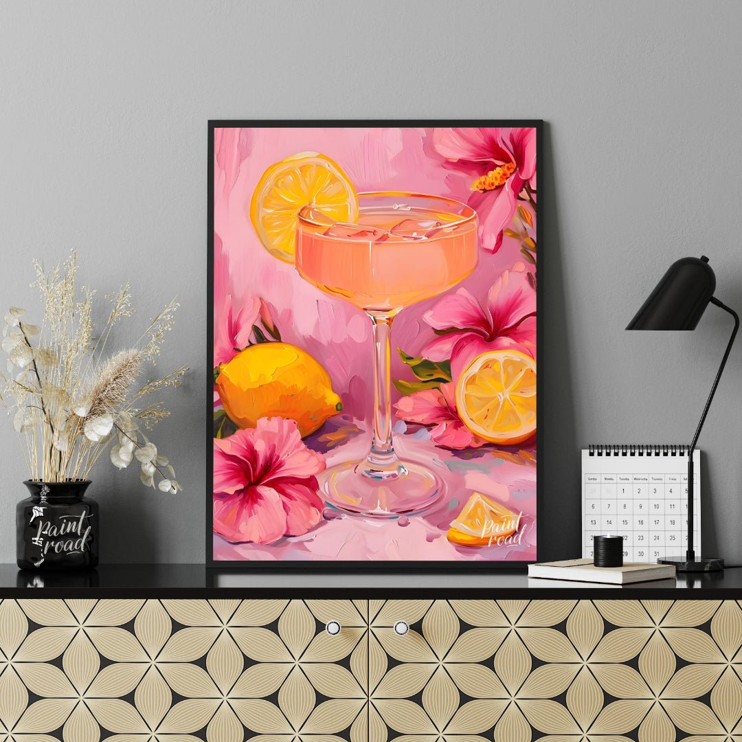 This vibrant painting captures a refreshing cocktail scene, with a pink drink garnished with a lemo… for living room