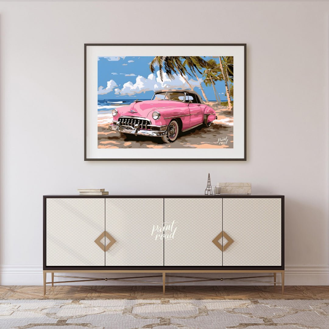 This vibrant art captures the nostalgic charm of a classic pink Cadillac convertible parked on a su… for living room