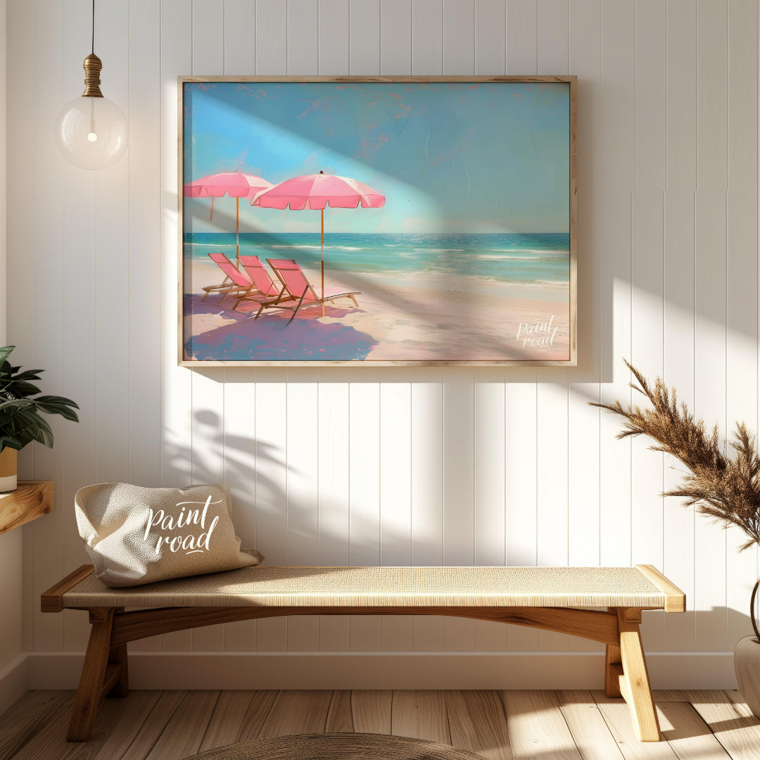 This artwork captures a tranquil beach scene with two pink parasols and matching lounge chairs set … for entryway