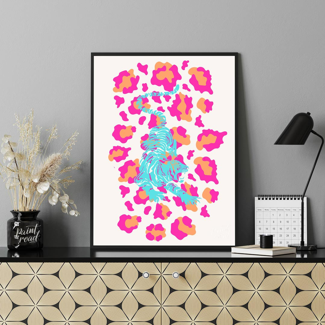 This incredibly vibrant and playfully designed art print features a dynamic, stylized tiger rendere… for office