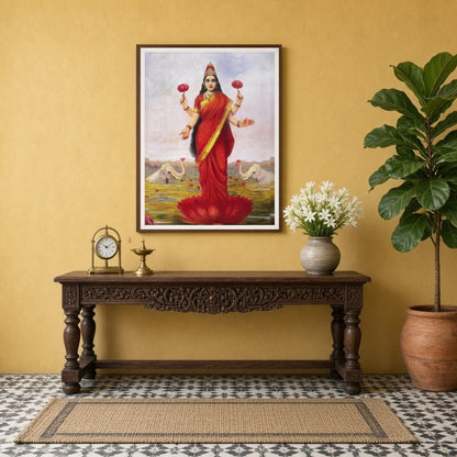 Immerse in the divine elegance of Goddess Lakshmi as she graces a lotus amidst a serene pond. Clad for Entrance
