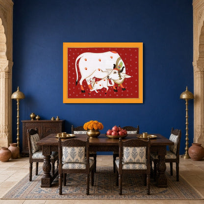 Experience the timeless beauty of Pichwai art with this vibrant depiction of Kamdhenu and her calf for Dining