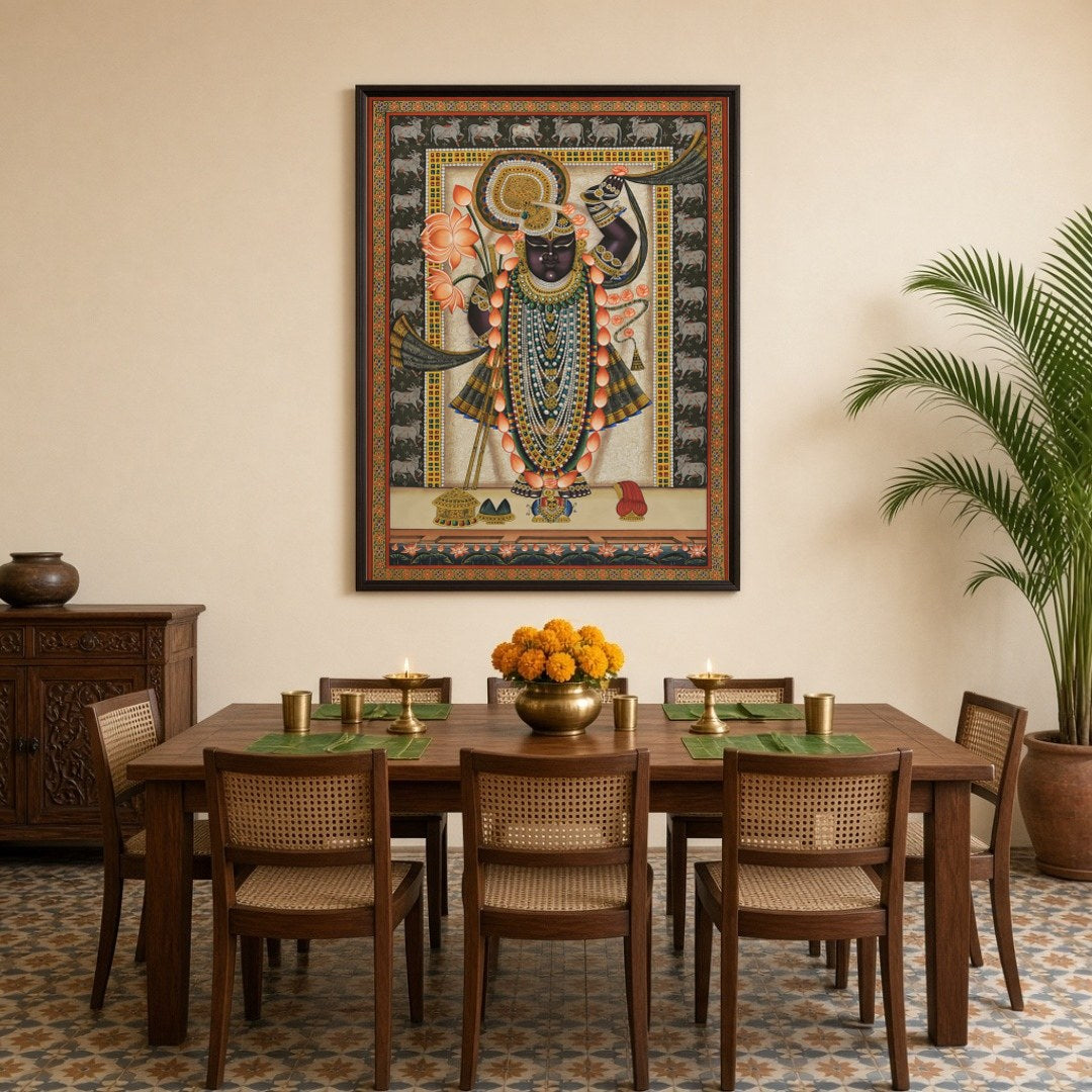 Celebrate the captivating grace of Shrinathji in this mesmerizing Pichwai artwork. Adorned with a for Dining