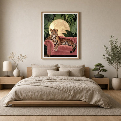 This captivating art print features a majestic leopard elegantly lounging on a plush pink velvet for Bedroom