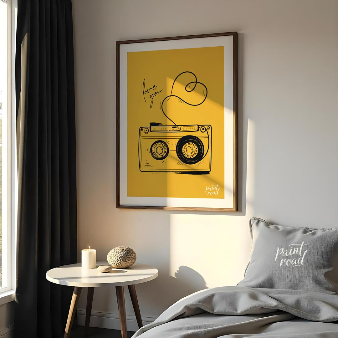 This nostalgic and charming art print features a classic retro cassette tape rendered in a clean, b… for bedroom