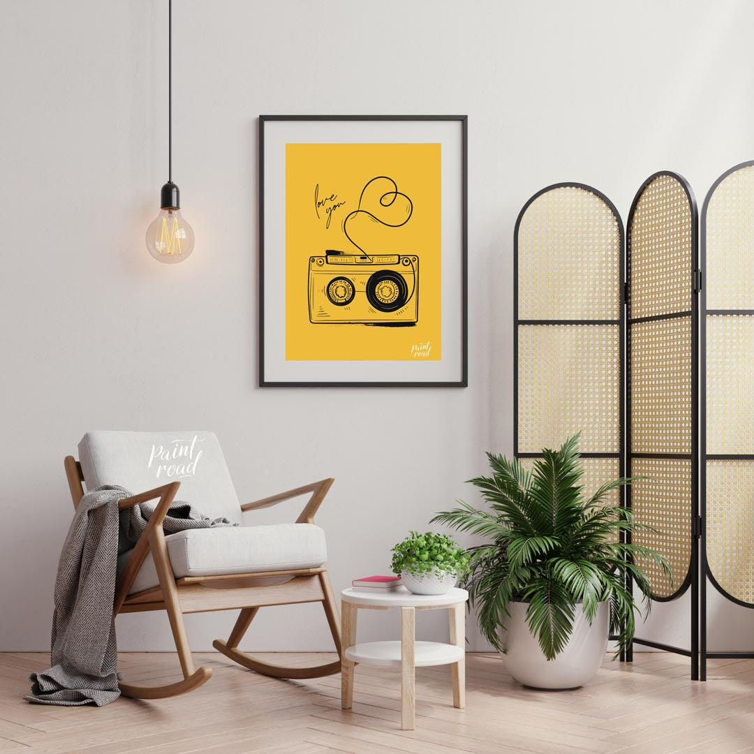 This nostalgic and charming art print features a classic retro cassette tape rendered in a clean, b… for living room