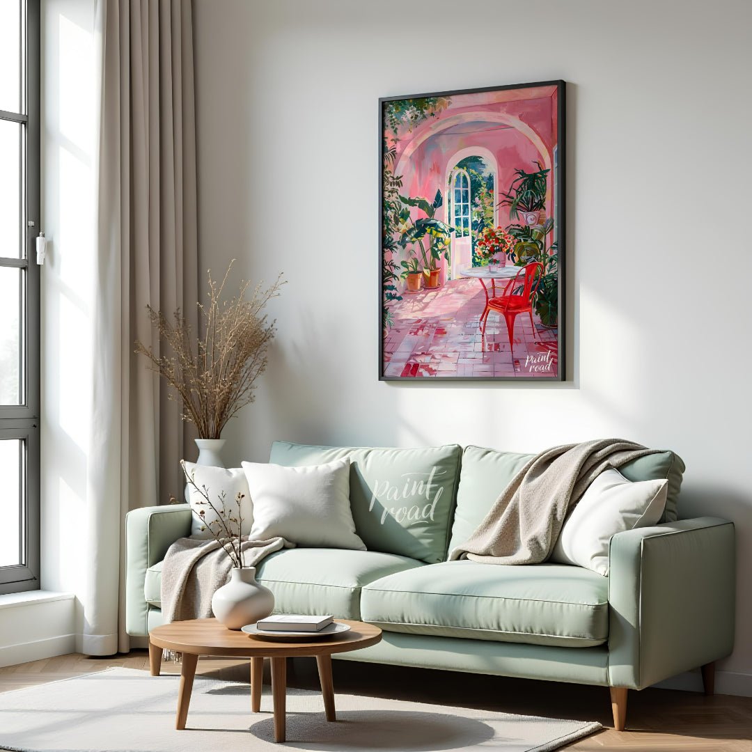 This captivating artwork depicts a sun-drenched courtyard bathed in a warm, rosy hue. A white table… for living room