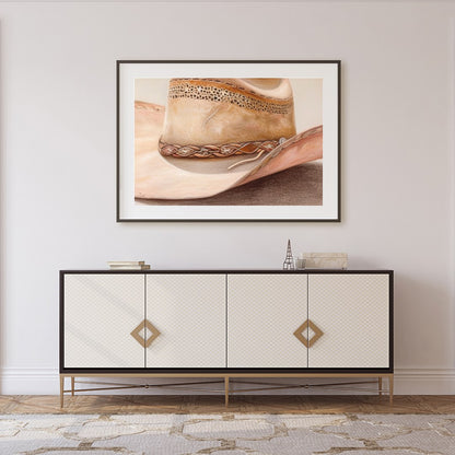 Capture the essence of the Wild West with this stunning artwork featuring a classic cowboy hat. The for Foyer