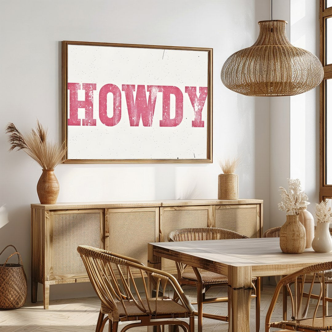 Add a playful Western charm to your space with this 'Howdy' wall art. Featuring a distressed pink for Dining