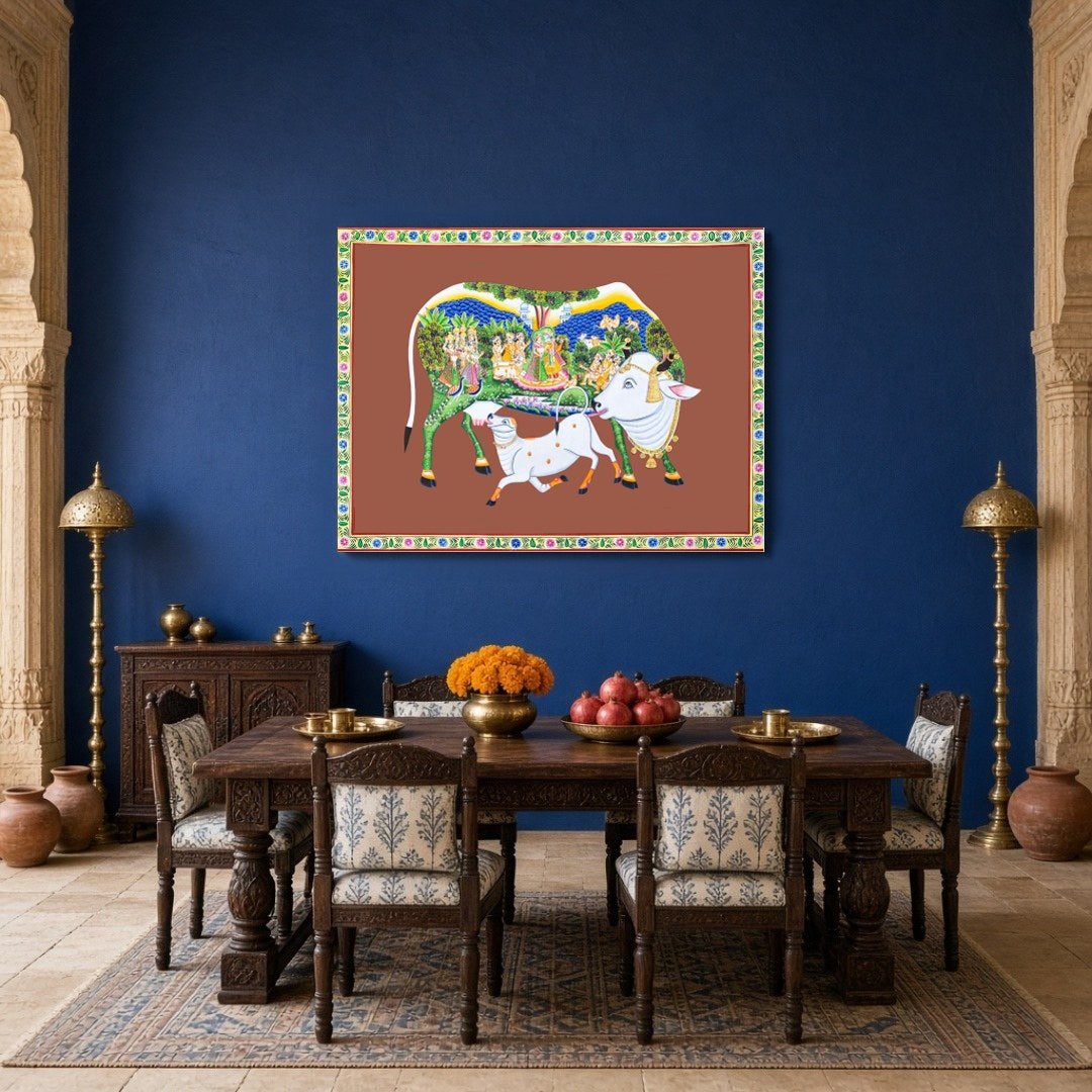 Immerse yourself in the sanctity and beauty of this Pichwai artwork featuring the revered Kamdhenu for Dining