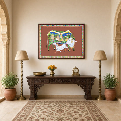 Immerse yourself in the sanctity and beauty of this Pichwai artwork featuring the revered Kamdhenu for Hallway