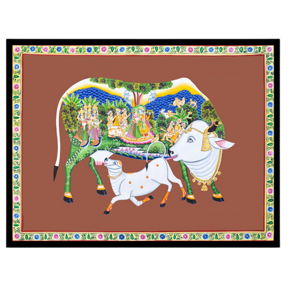 Immerse yourself in the sanctity and beauty of this Pichwai artwork featuring the revered Kamdhenu for living-space