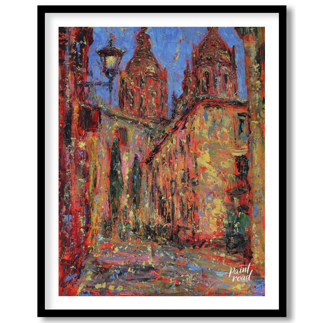 This painting captures a vibrant street scene in Salamanca, featuring the iconic spires of the city… for room
