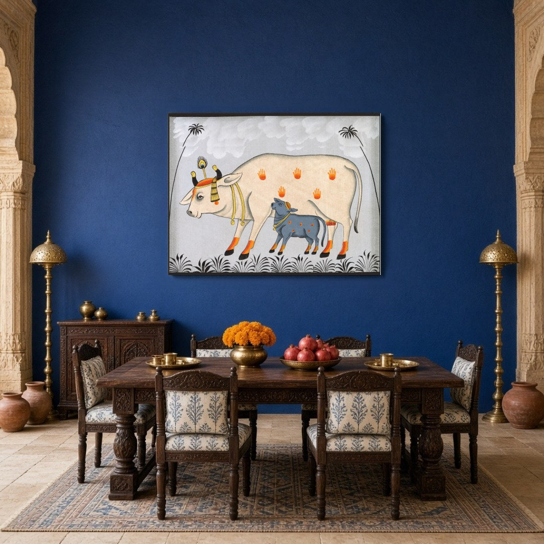 This captivating Pichwai artwork beautifully portrays Kamdhenu with her calf amidst a tranquil for Dining