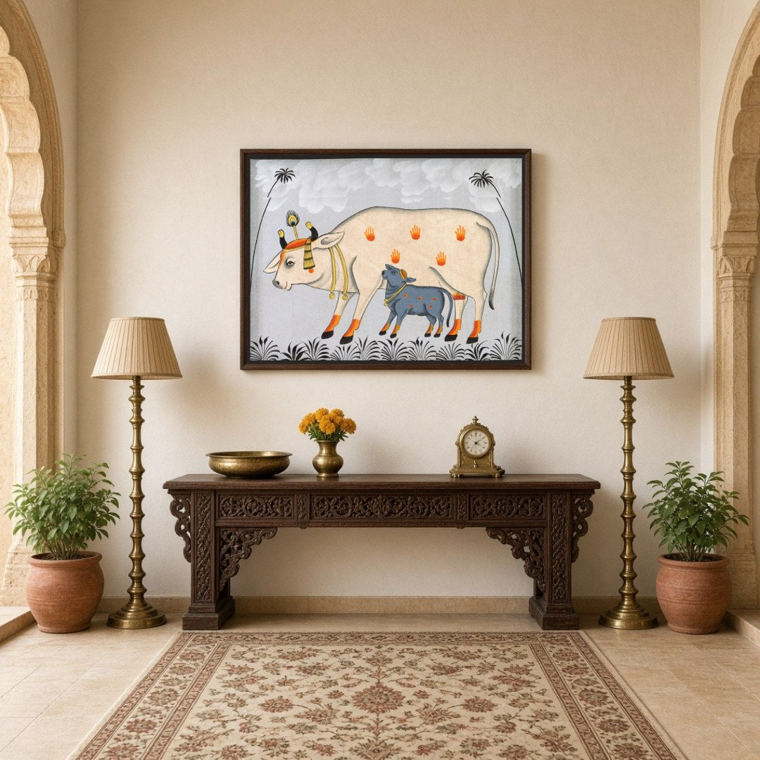 This captivating Pichwai artwork beautifully portrays Kamdhenu with her calf amidst a tranquil for Hallway