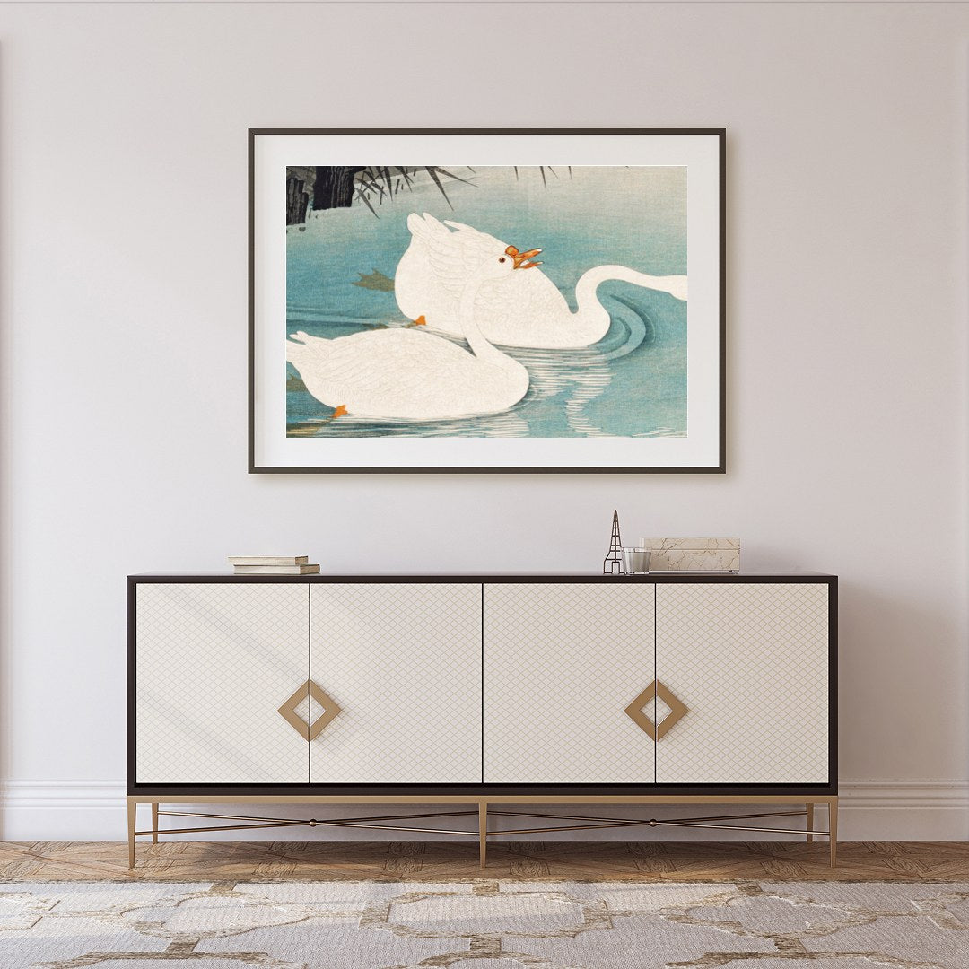 Experience the grace and elegance of nature with this exquisite depiction of swans gliding through for Foyer