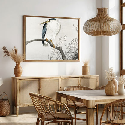 This exquisite artwork captures the tranquil beauty of a heron perched gracefully on a bare branch, for Dining