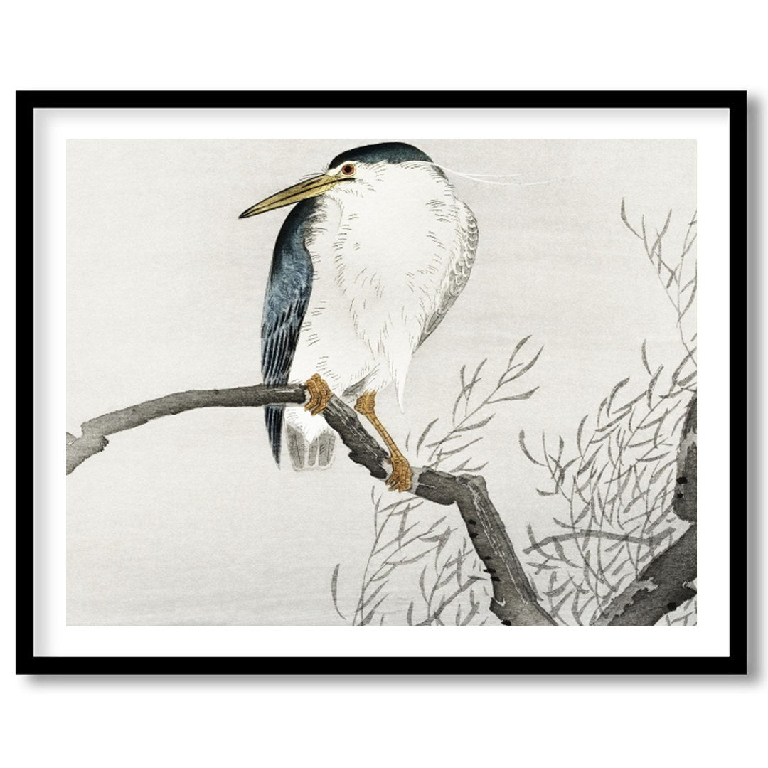This exquisite artwork captures the tranquil beauty of a heron perched gracefully on a bare branch, for home