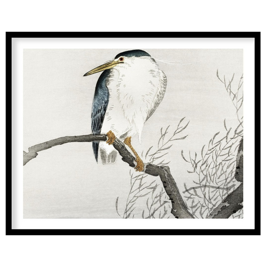 This exquisite artwork captures the tranquil beauty of a heron perched gracefully on a bare branch, for home