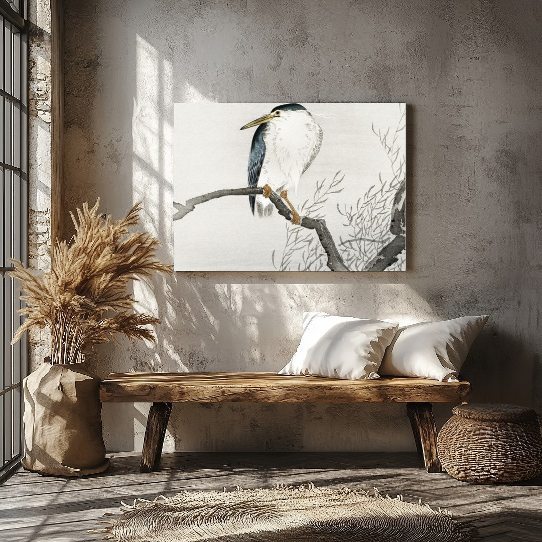 This exquisite artwork captures the tranquil beauty of a heron perched gracefully on a bare branch, for Veranda