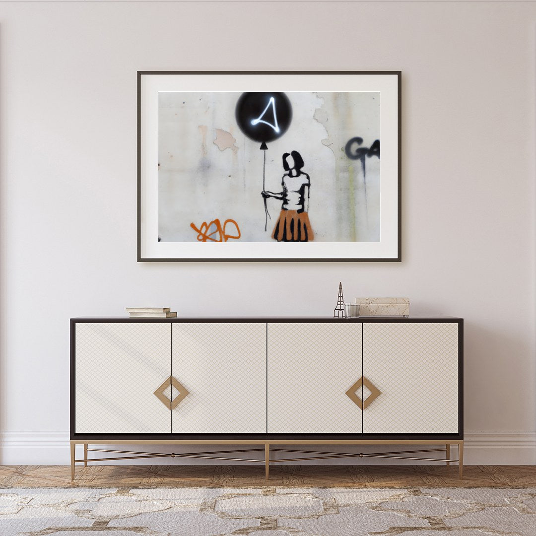 Discover a thought-provoking piece with the 'Silhouette Balloon Graffiti,' capturing the essence of for Foyer